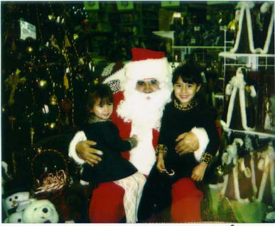 Sarah & Lisa on Santa's lap.